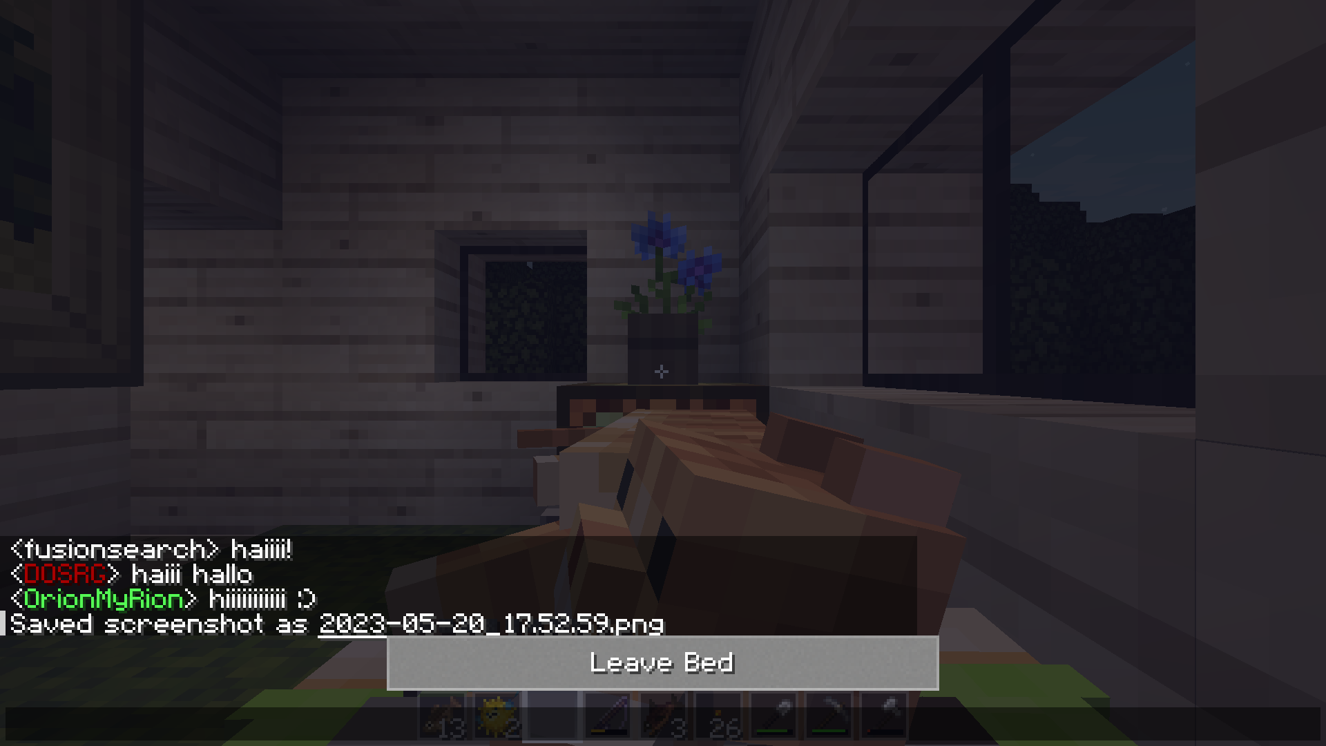 a screenshot from minecraft. the player is laying in bed to sleep. an orange cat is laying on their belly